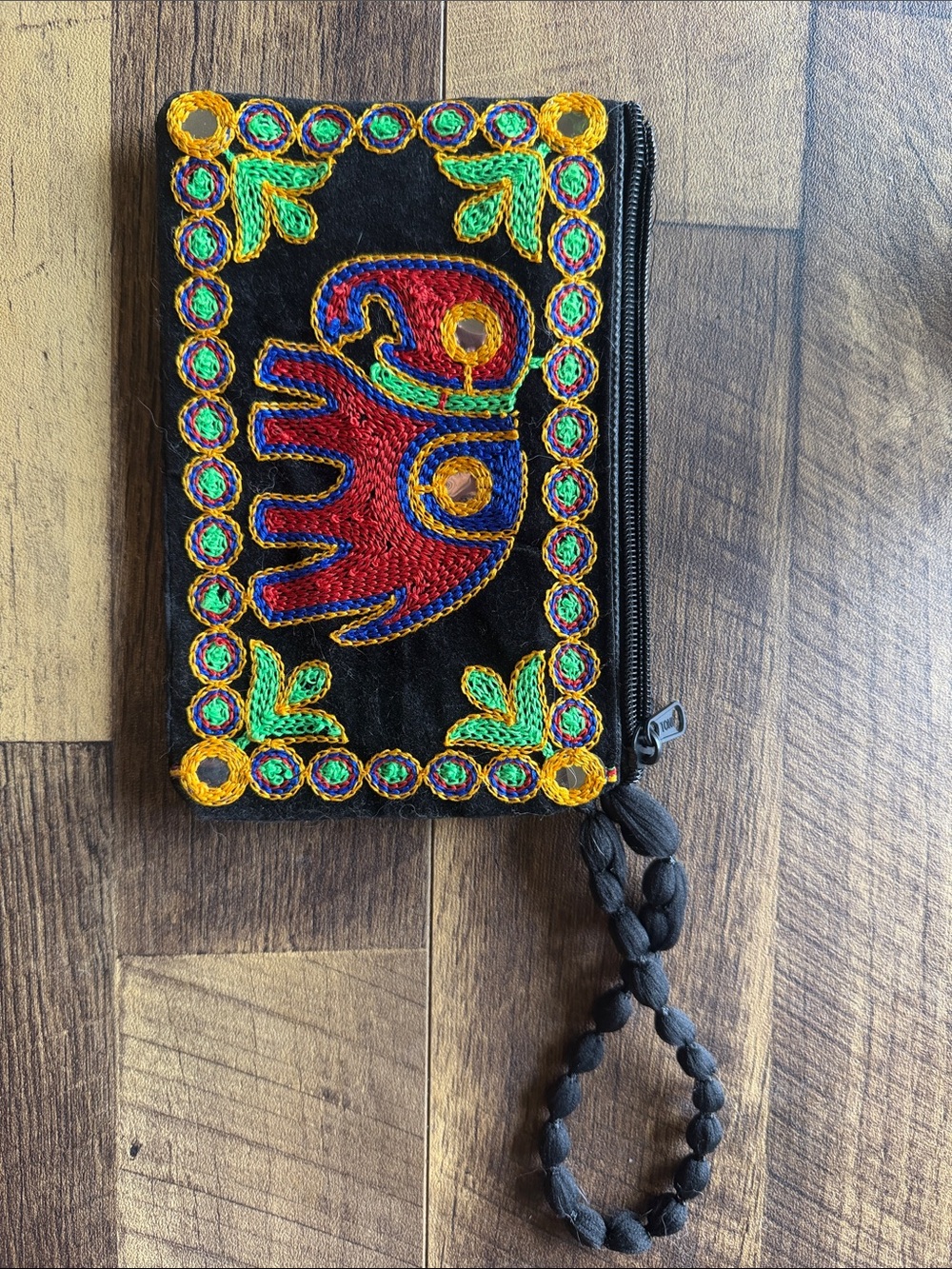 Embroidered Elephant Wristlet Clutch in Black